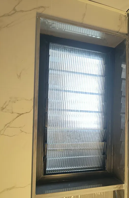 uPVC bathroom window with adjustable glass louvres